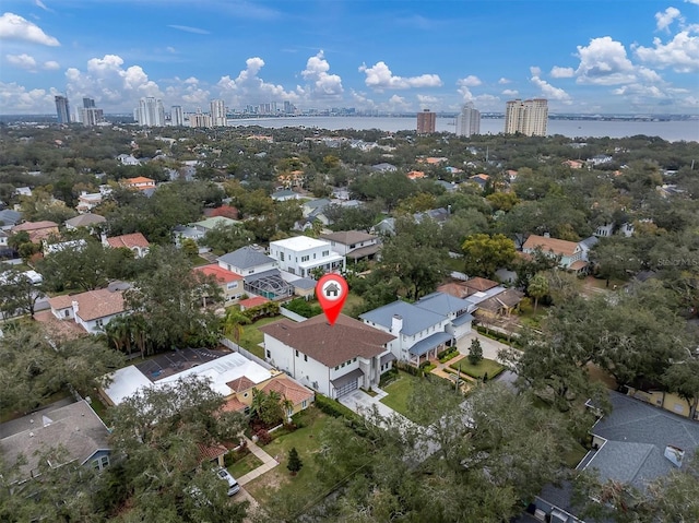 birds eye view of property featuring a water view