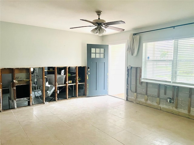 entryway featuring ceiling fan