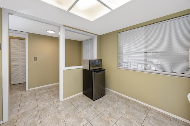 interior space with light tile patterned floors