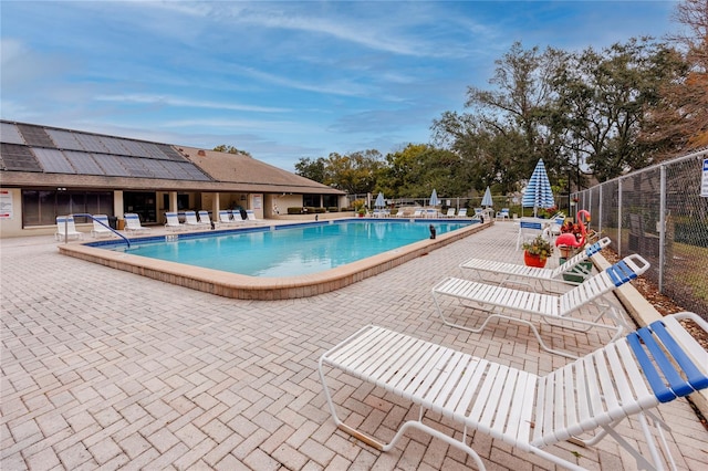 view of swimming pool featuring a patio