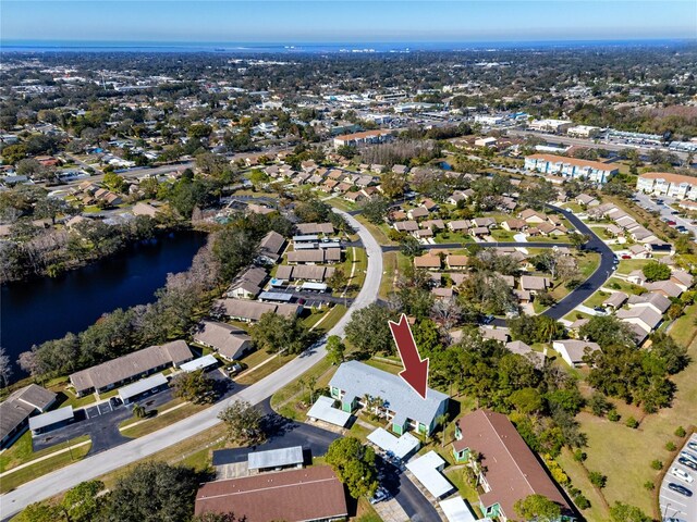 drone / aerial view with a water view