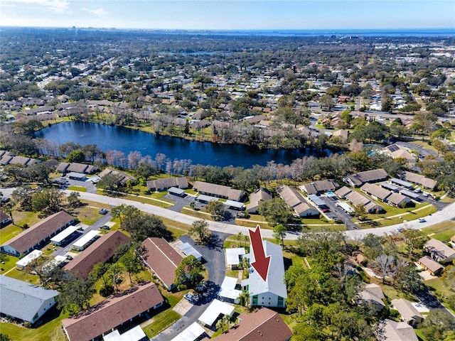 bird's eye view with a water view