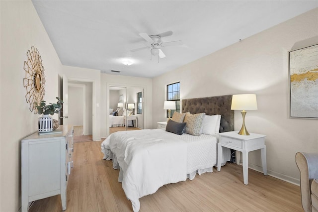 bedroom featuring ceiling fan and light hardwood / wood-style floors