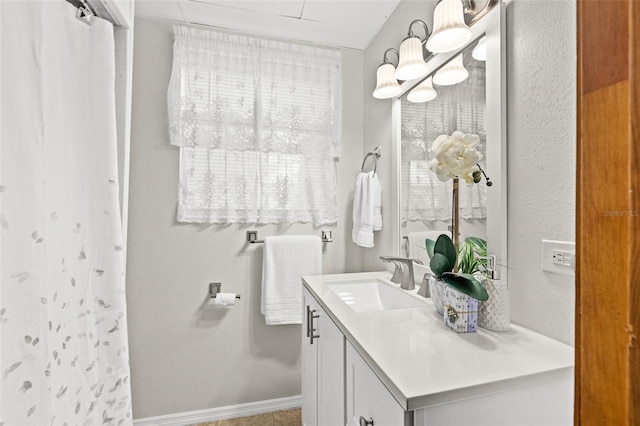 bathroom with vanity and walk in shower