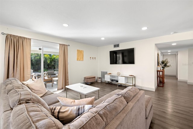 living room with dark hardwood / wood-style floors