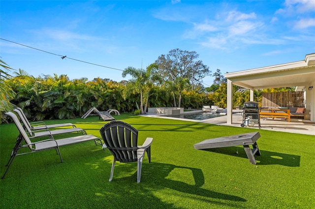 surrounding community featuring a swimming pool, a lawn, and a patio area