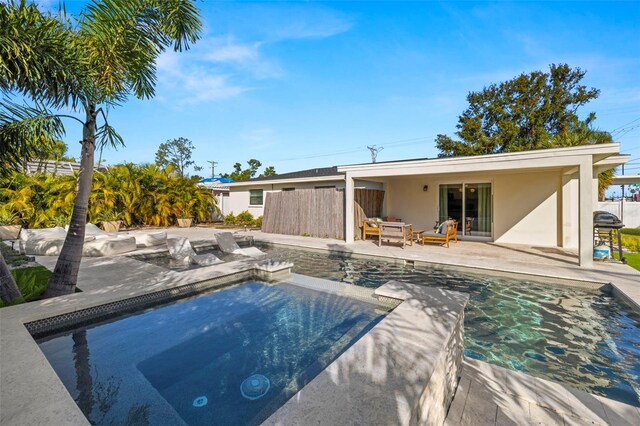 view of pool featuring a patio area