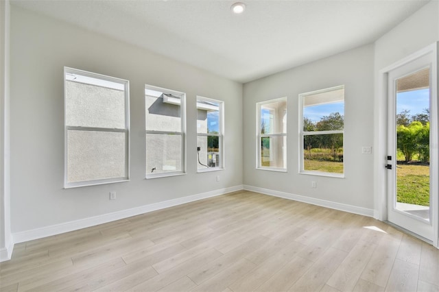 unfurnished sunroom featuring plenty of natural light