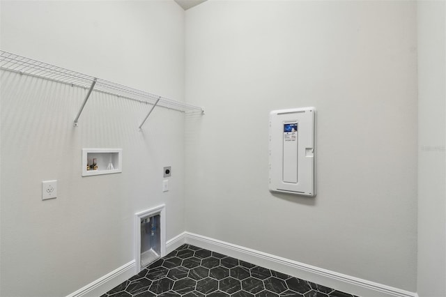 laundry room featuring tile patterned floors, washer hookup, and hookup for an electric dryer