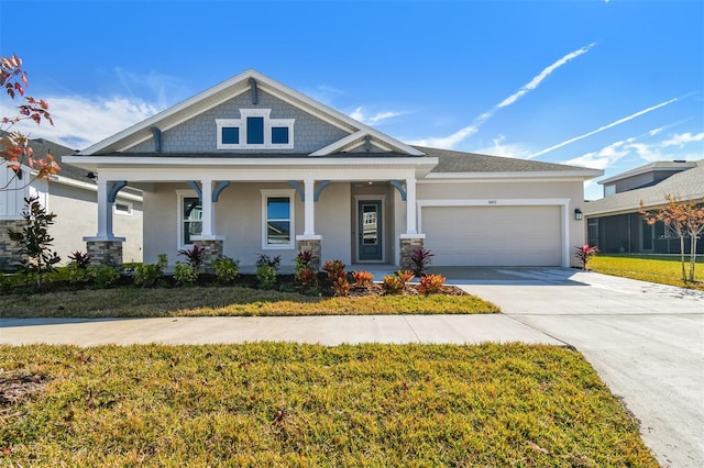 view of front of house featuring a garage, a porch, and a front lawn