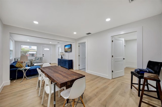 dining room featuring light hardwood / wood-style flooring