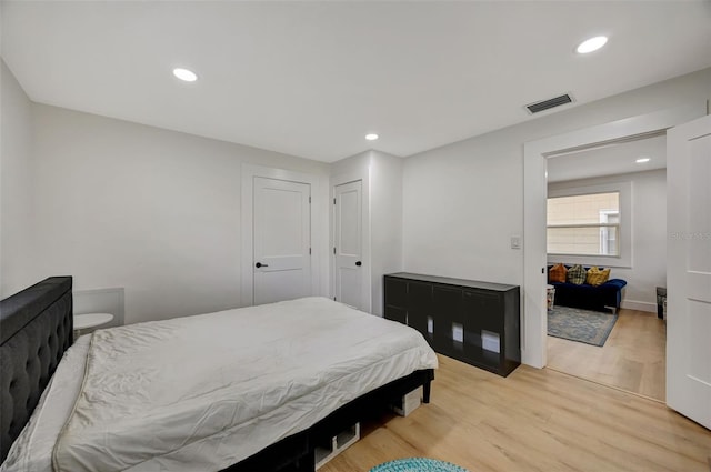 bedroom featuring light wood-type flooring