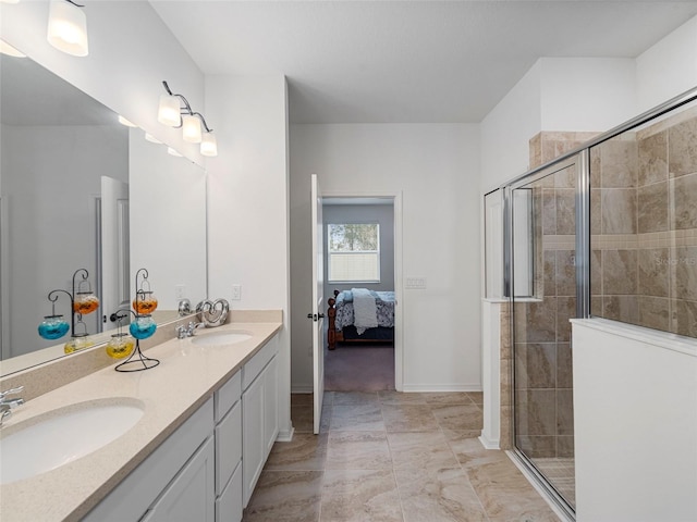 bathroom with an enclosed shower and vanity