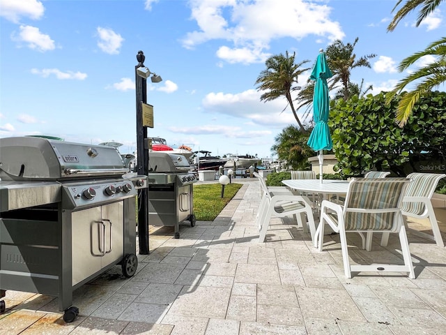 view of patio / terrace featuring area for grilling and outdoor dining space