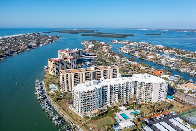 birds eye view of property featuring a water view and a view of city