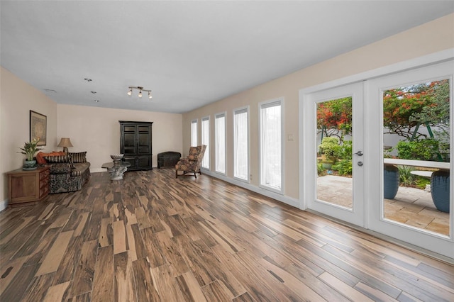 546 Orangewood Dr, Dunedin, FL 34698 - sitting room with wood finished floors and baseboards
