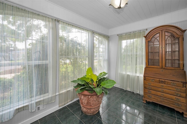 546 Orangewood Dr, Dunedin, FL 34698 - sunroom / solarium featuring tile patterned flooring