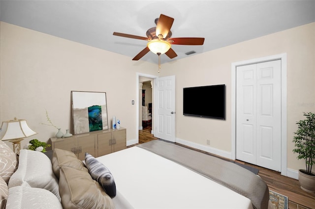 546 Orangewood Dr, Dunedin, FL 34698 - bedroom featuring wood finished floors, baseboards, and ceiling fan