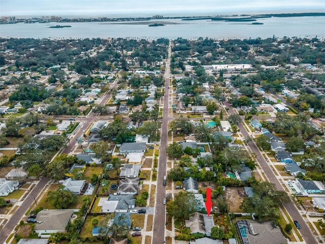 546 Orangewood Dr, Dunedin, FL 34698 - aerial overview of property's location featuring a large body of water and nearby suburban area