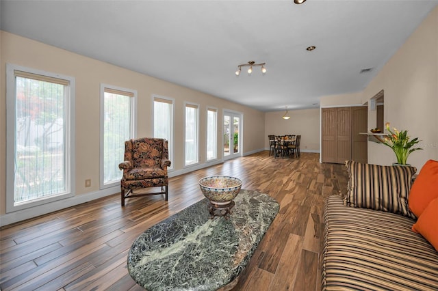 546 Orangewood Dr, Dunedin, FL 34698 - living room featuring wood finished floors and baseboards