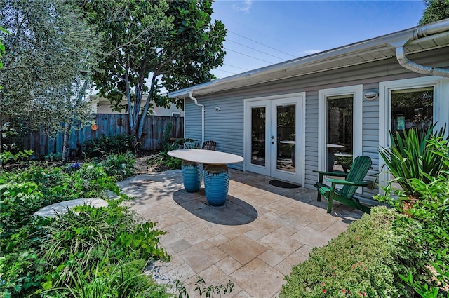 546 Orangewood Dr, Dunedin, FL 34698 - view of patio featuring french doors
