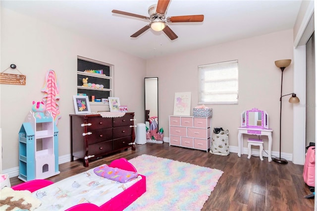 bedroom featuring dark hardwood / wood-style floors and ceiling fan