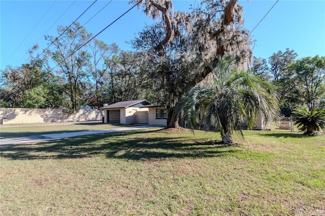 view of yard featuring a garage