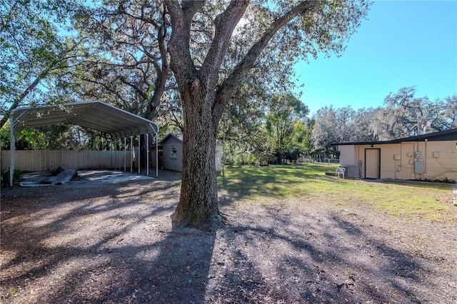 view of yard featuring a carport