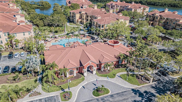 birds eye view of property featuring a water view