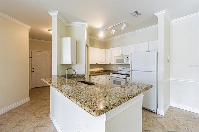 kitchen with kitchen peninsula, sink, white cabinetry, light stone countertops, and white appliances