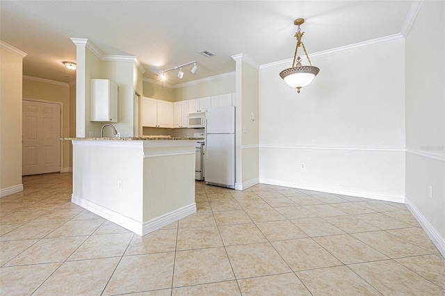 kitchen with white appliances, crown molding, light tile patterned floors, white cabinets, and sink