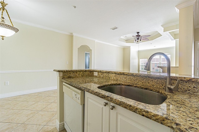 kitchen featuring white dishwasher, sink, crown molding, and stone counters