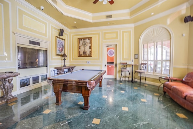 playroom with pool table, a raised ceiling, ceiling fan, and ornamental molding