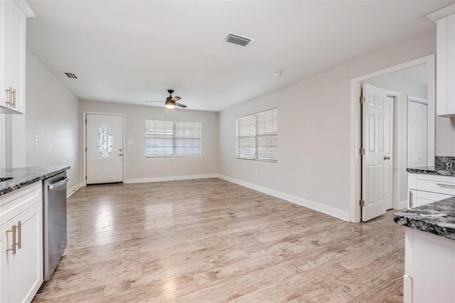 interior space featuring ceiling fan and light hardwood / wood-style flooring