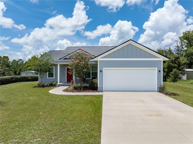 view of front facade featuring a garage and a front yard