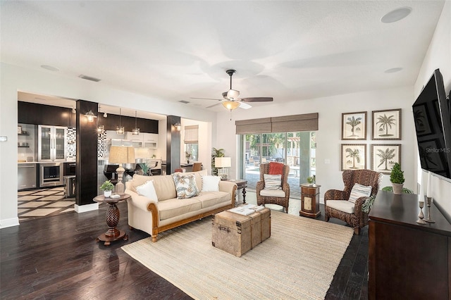 living room with ceiling fan, wood-type flooring, and wine cooler