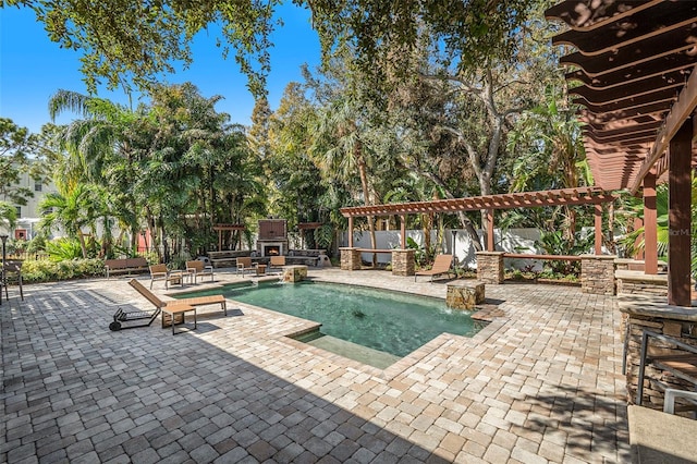 view of swimming pool with pool water feature, a pergola, an outdoor stone fireplace, and a patio area