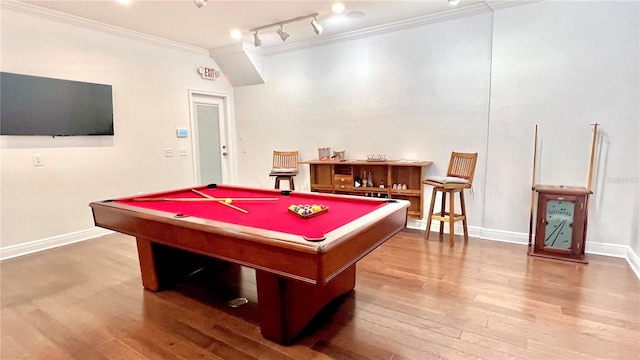 recreation room with wood-type flooring, billiards, and ornamental molding