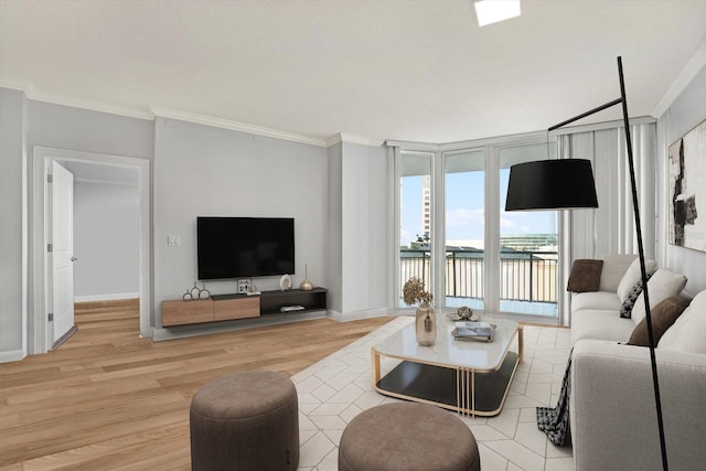 450 Knights Run Ave Unit 605, Tampa, FL 33602 - living room with crown molding, a wall of windows, and light hardwood / wood-style flooring