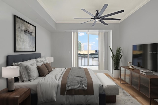 450 Knights Run Ave Unit 605, Tampa, FL 33602 - bedroom featuring crown molding, access to outside, ceiling fan, and light hardwood / wood-style flooring