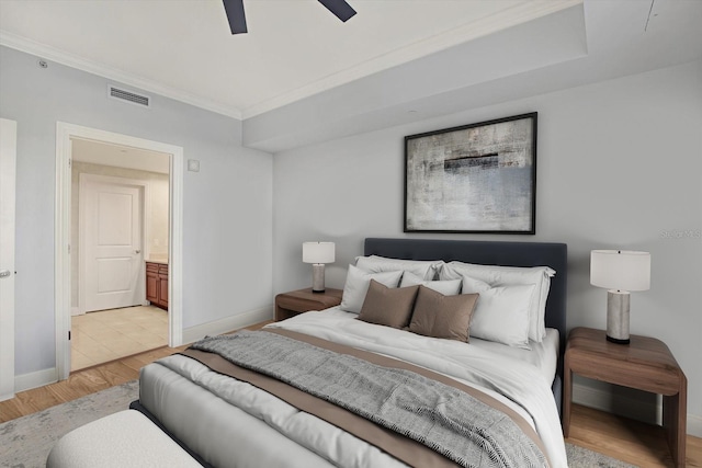450 Knights Run Ave Unit 605, Tampa, FL 33602 - bedroom featuring crown molding, ceiling fan, and light hardwood / wood-style flooring