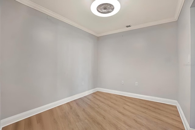 450 Knights Run Ave Unit 605, Tampa, FL 33602 - spare room with ornamental molding and hardwood / wood-style floors