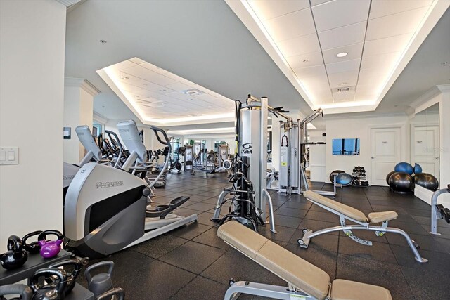 450 Knights Run Ave Unit 605, Tampa, FL 33602 - workout area featuring ornamental molding, a raised ceiling, and a drop ceiling