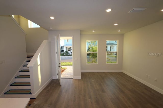 entrance foyer with baseboards, visible vents, dark wood finished floors, and recessed lighting