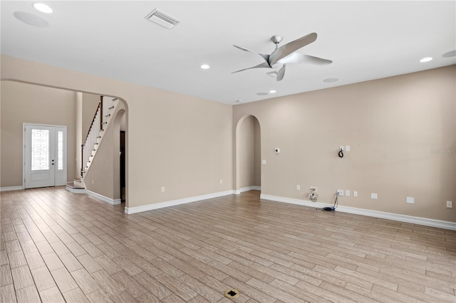 interior space with light hardwood / wood-style floors and ceiling fan