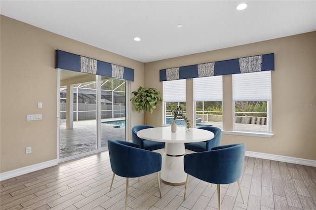 dining room with light hardwood / wood-style flooring