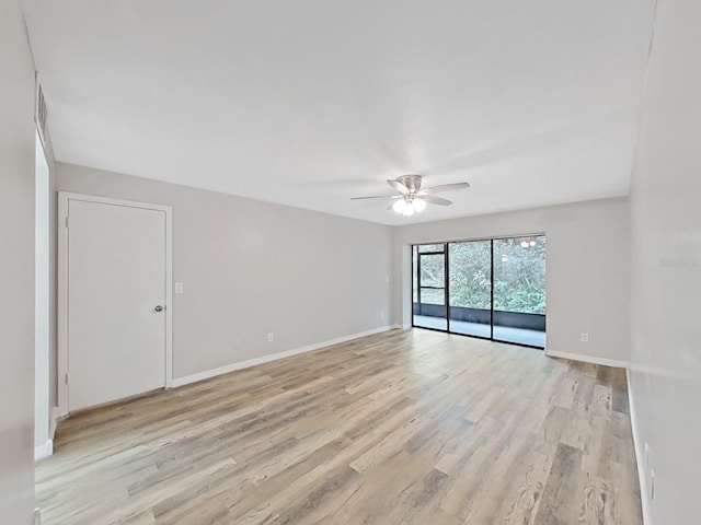 unfurnished room featuring light hardwood / wood-style floors and ceiling fan