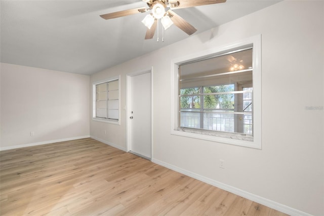 unfurnished room with light hardwood / wood-style flooring and ceiling fan