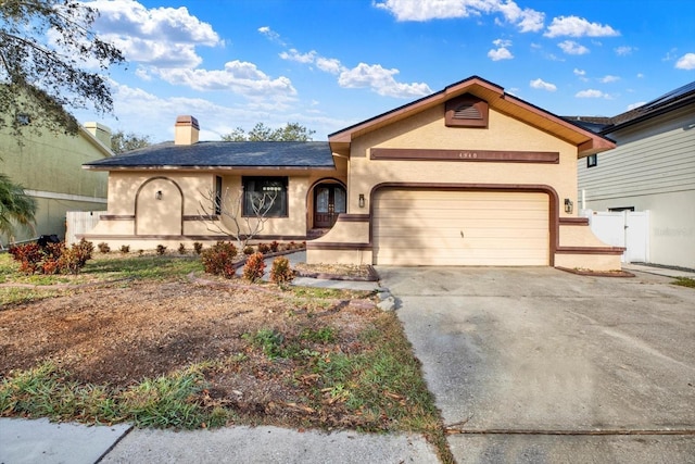 ranch-style home with a garage