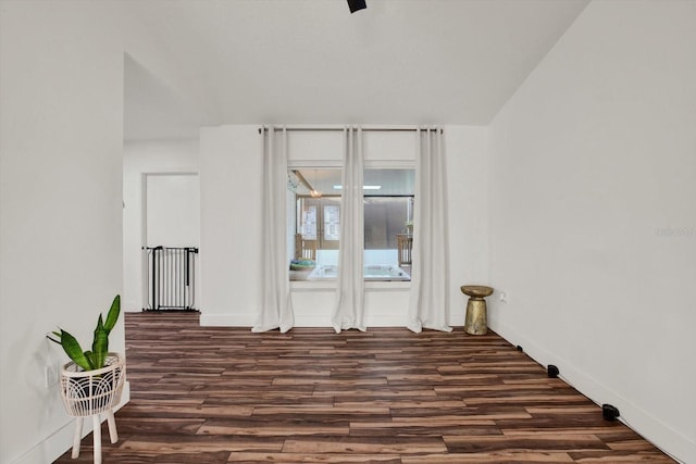 empty room featuring dark hardwood / wood-style floors